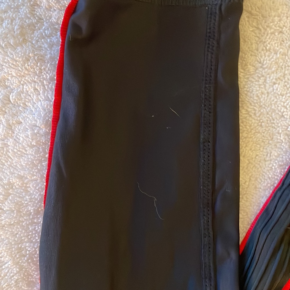 Black with red lines on side workout leggings, terez